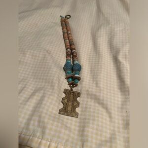 Twine and twig pendant necklace. Excellent condition comes with a bag